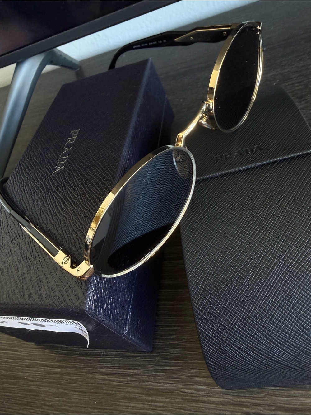 Prada PR 65ZS Gold Frame Round Sunglasses with Gray Lenses